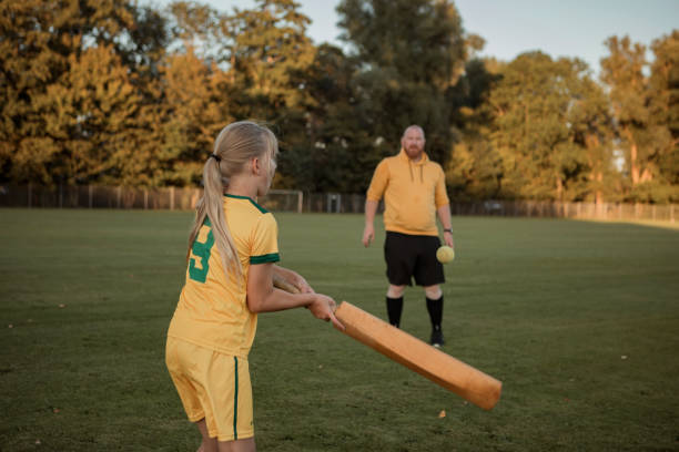 istock Cricket father and daughter working hard during a coaching session 1423287146