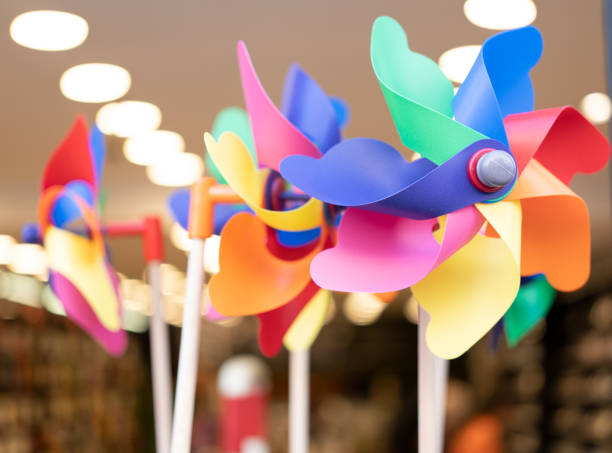istock colorful assorted windmills. colored green, yellow, blue and red. 1423297935