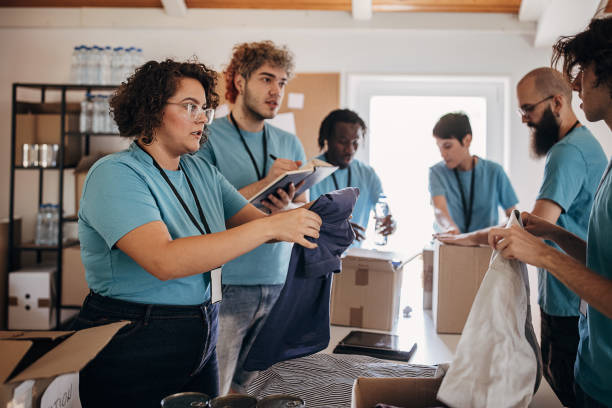 istock Volunteers in charity center 1423300254