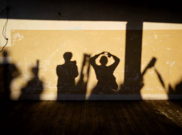 Two Man Shadow While Ragging 22,400+ Shadows Wall People Stock Photos, Pictures & Royalty-Free ...