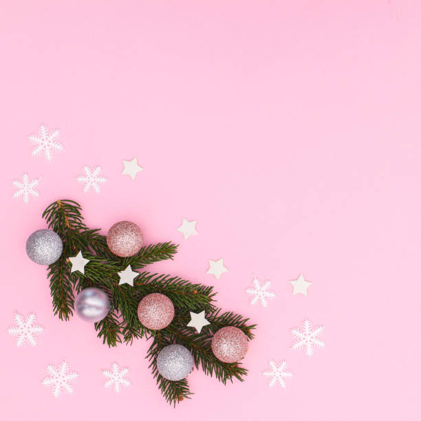 istock Creative Christmas commposition with ornaments and fir branch on copy space pink background. FLat lay 1423306148