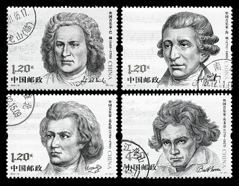 Old used stamps of Great Britain scanned on black background. In aRGB colorspace for optimal printing.