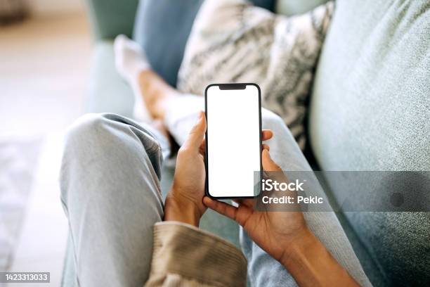 Unrecognisable Woman Holding Smart Phone With White Screen Stock Photo - Download Image Now