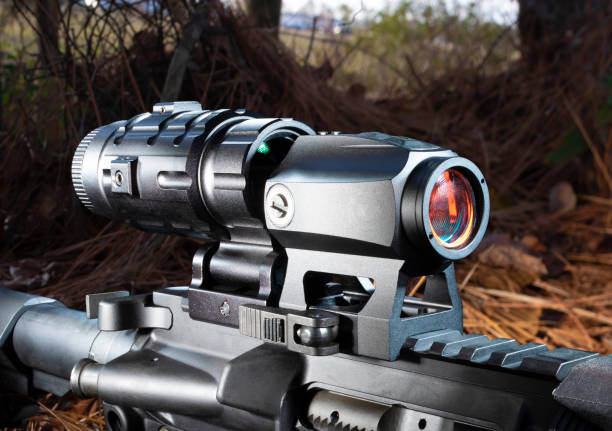 istock Gun with red dot sight and magnifier 1423317037