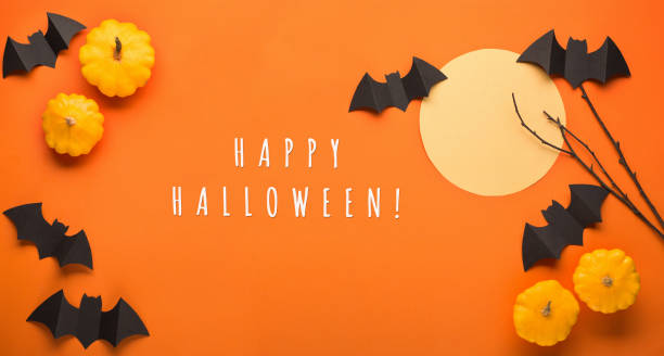 Halloween Paper Holiday Card with Black bats, orange background.