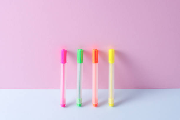 istock Back to school. Colored markers on a pink background 1423320480