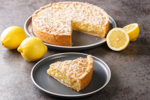 istock Grated cake Lemon curd pie close-up in a plate. Horizontal 1423322424