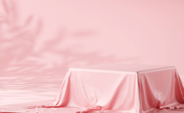 istock Pink pastel podium with pink fabric, cloth background 1423325812