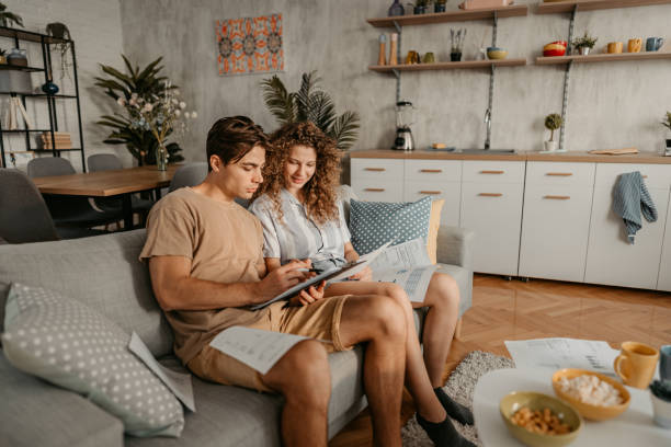 istock Young Couple Discussing Their Finances 1423325860