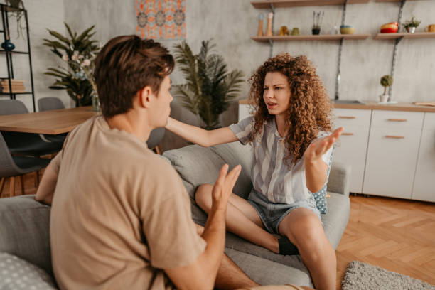 istock Young Couple Arguing At Home 1423326019