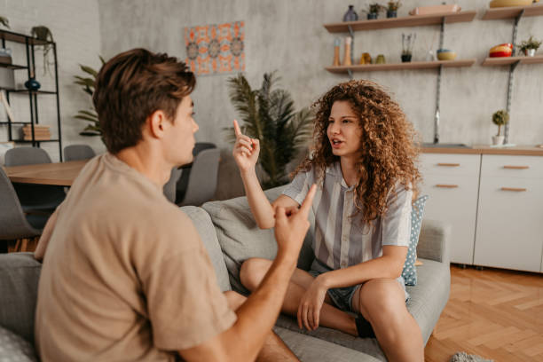 istock Young Couple Arguing At Home 1423326044