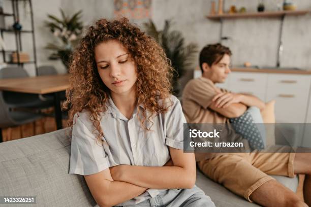 Young Couple Arguing At Home Stock Photo - Download Image Now - Young Couple, Couple - Relationship, White People