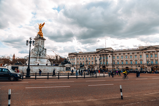 Famous and the main symbol of London Buckingham Palace and The Union Jack flag is flying at half-mast