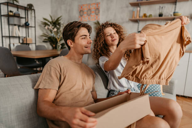istock Girlfriend And Boyfriend Opening A Package They Ordered Online 1423326775