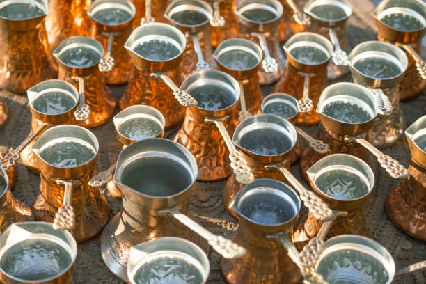 istock Many golden pots or kettles for Turkish coffee 1423330764