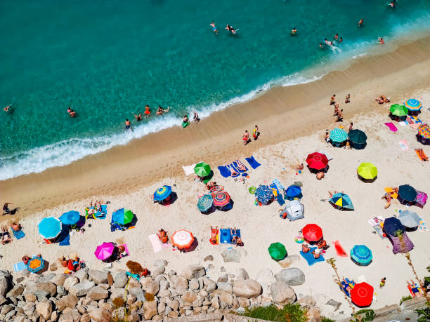 istock Italian beaches with tourists top view 1423333626