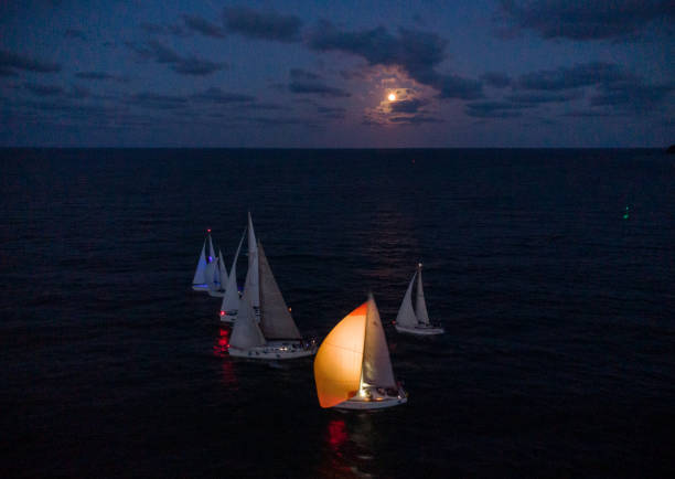 istock Luxury yachts at Sailing regatta at fool moon night. 1423334894