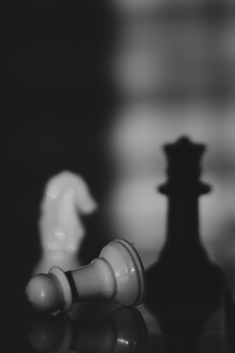 Chess Board image of knocked out piece of pawn