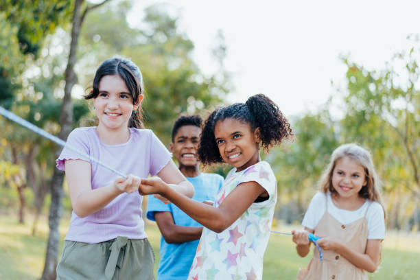 istock Children playing tug of war 1423340467