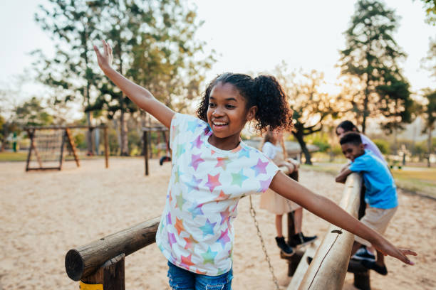 istock Children playing in the playground 1423340558