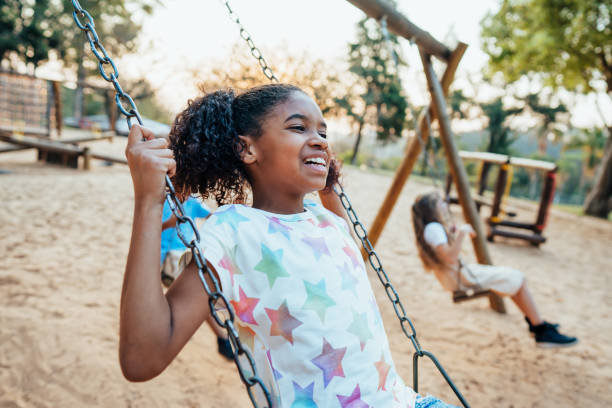 istock Children playing in the playground 1423340595
