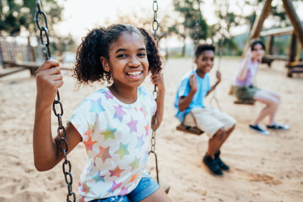 istock Children playing in the playground 1423341108