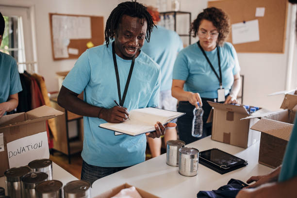 istock Work day in charity center 1423343112