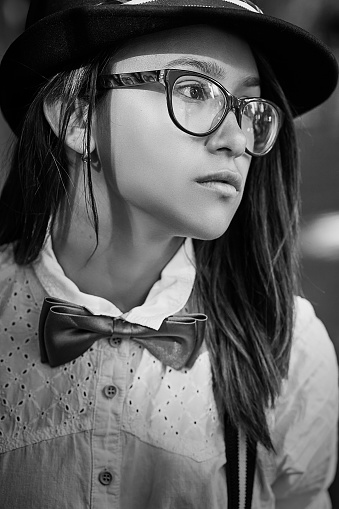 pretty girl hipster in eyeglasses portrait monochrome