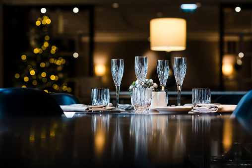 A decorated banquet table with appetizers awaiting guests