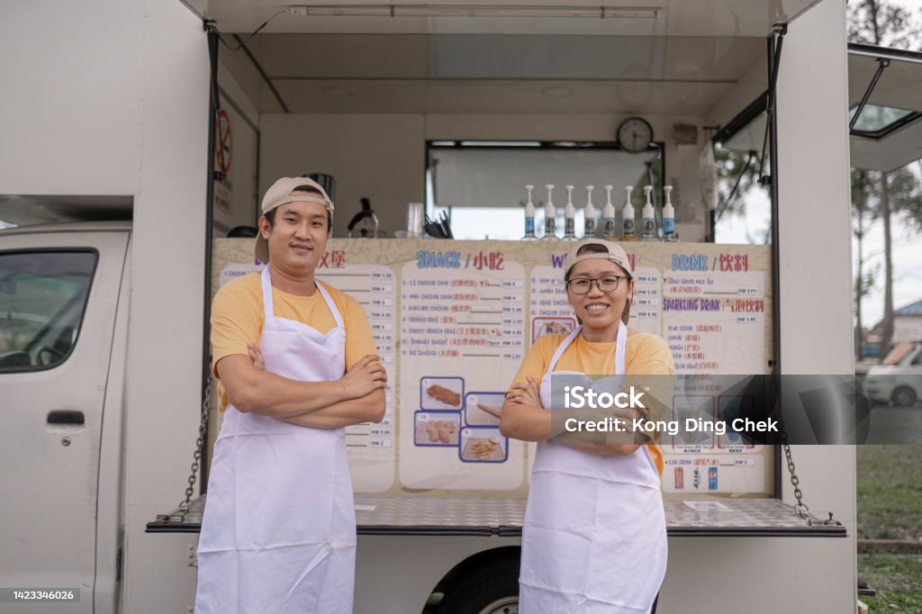 Asian Chinese Food Truck Owners Arm Cross Smiling In Front Food Truck