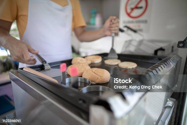 Asian Chinese Owner Working In Food Truck Stock Photo - Download Image Now - Adult, Adults Only, Apron