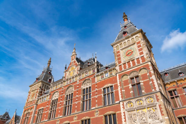 istock Amsterdam downtown canal district during summer 1423346090