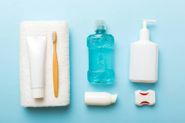 istock Mockup for bathing products top view flat lay, spa razor, toothpaste, soap, gel and other various accessories. Cosmetics for skin health. Bath Mockup for your logo 1423346311