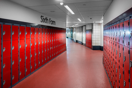 A corridor lined with lockers in a secondary school in the North East of England.