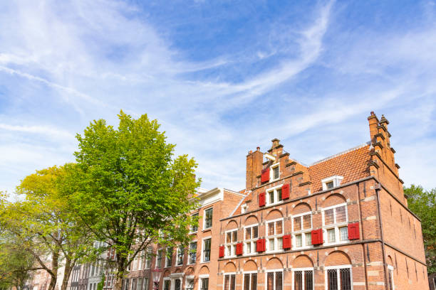 istock Amsterdam downtown canal district during summer 1423346750