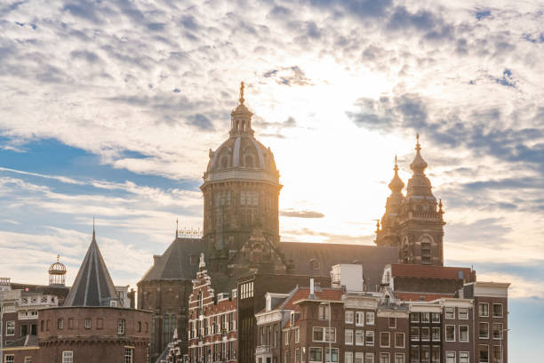 istock Amsterdam downtown canal district during summer 1423346846