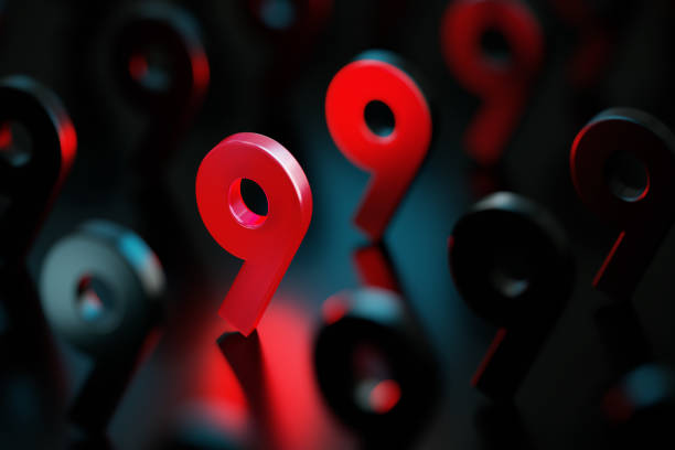 Red number nine glowing amid black numbers on black background. Horizontal composition with copy space. Standing out from the crowd concept.