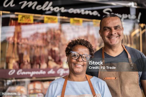 Portrait Of Employees Together In A Butchers Shop Stock Photo - Download Image Now - Entrepreneur, Business, Active Seniors