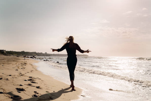istock woman walking away 1423351286