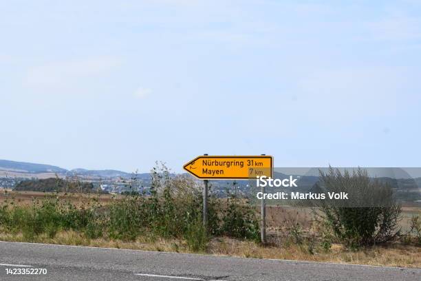 Traffics Sign To Mayen And The Nürburgring Stock Photo - Download Image Now - Nürburgring, Architecture, Block Shape