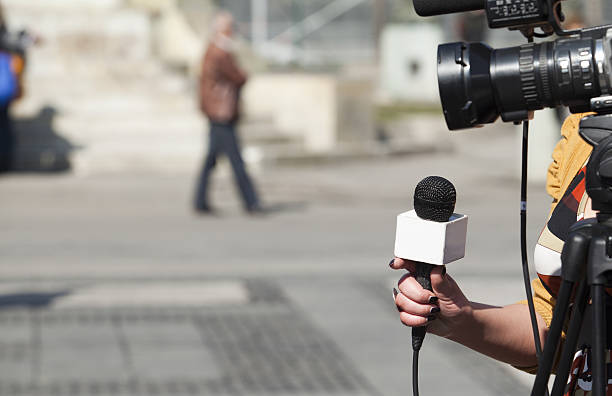 TV interview TV reporter interview. journalist stock pictures, royalty-free photos & images