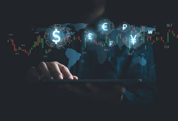 istock Global currency exchange and money transfer concept, Businessman using tablet with world map and currency sign include dollar yuan yen euro and pound sterling. 1423357475