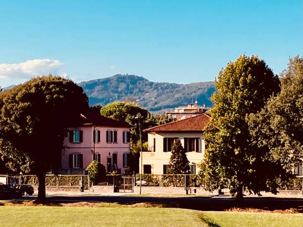 istock Tuscan houses with mountains in the background 1423358349