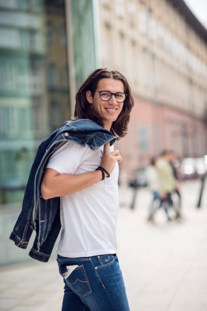 istock young man spend time in the city 1423358838