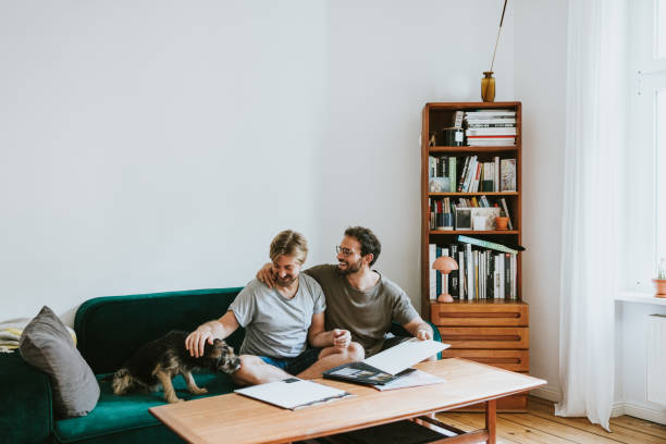 istock Male couple spending leisure time at home 1423360048