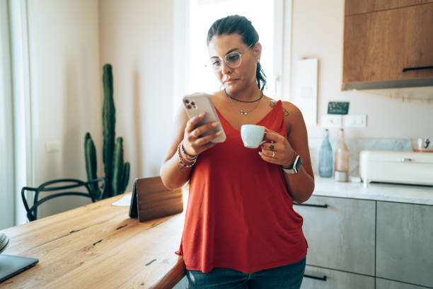 istock early morning checking the phone at home 1423361232
