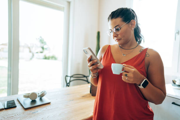 istock early morning checking the phone at home 1423361289