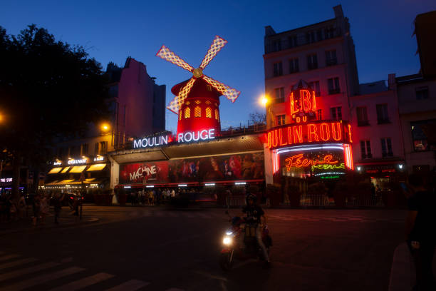Cabaret Moulin Rouge in the Night Time in Paris Paris, France - July, 15: Cabaret Moulin Rouge in the Night Time in Paris on July 15, 2022 place pigalle stock pictures, royalty-free photos & images