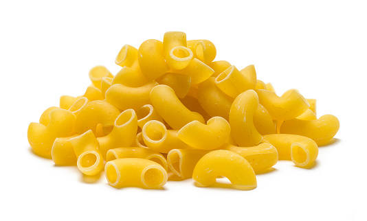 Small Pile of Macaroni Noodles Cut Out on White.