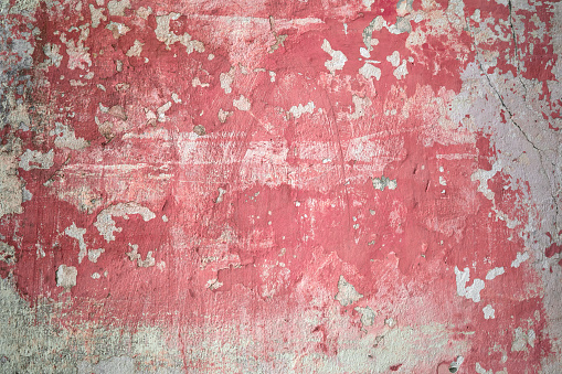 Red white painted plaster old grunge wall texture background, full frame